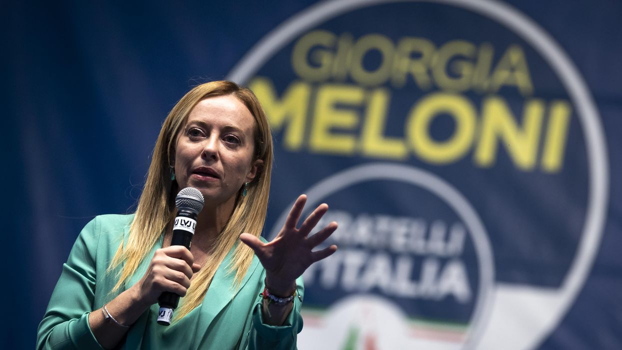 Giorgia Meloni, leader of Italian far-right party Brothers of Italy, gestures during a campaign rally in Turin.