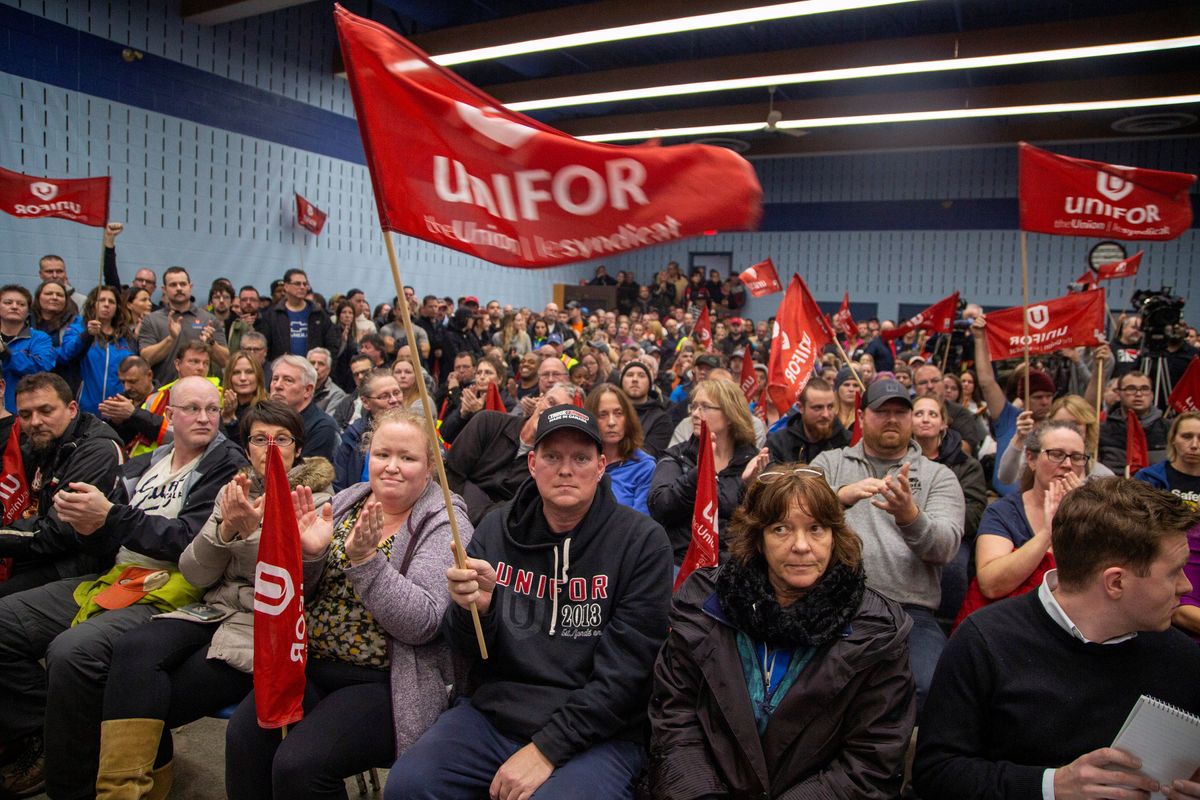 GM workers gather for a meeting at UNIFOR Local 222 near the General Motors' assembly plant in Oshawa, Ontario.