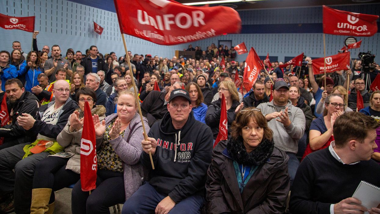 GM workers gather for a meeting at UNIFOR Local 222 near the General Motors' assembly plant in Oshawa, Ontario.