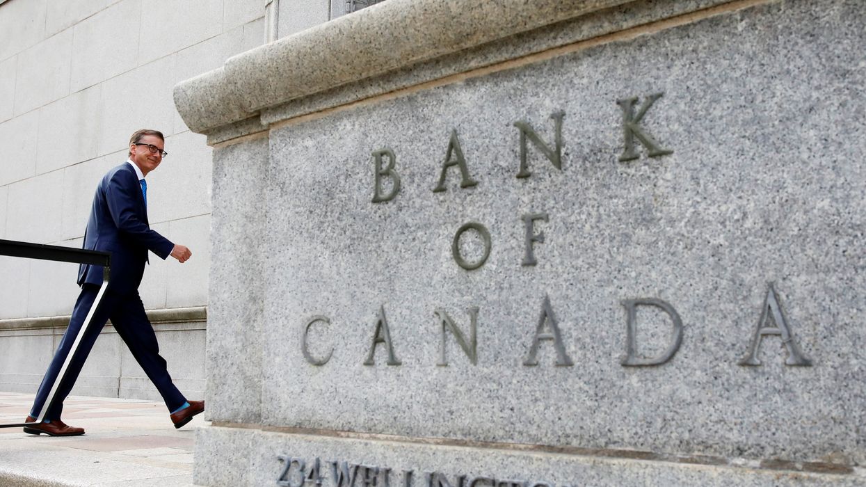 Governor of the Bank of Canada Tiff Macklem walks outside the Bank of Canada building in Ottawa, Ontario.