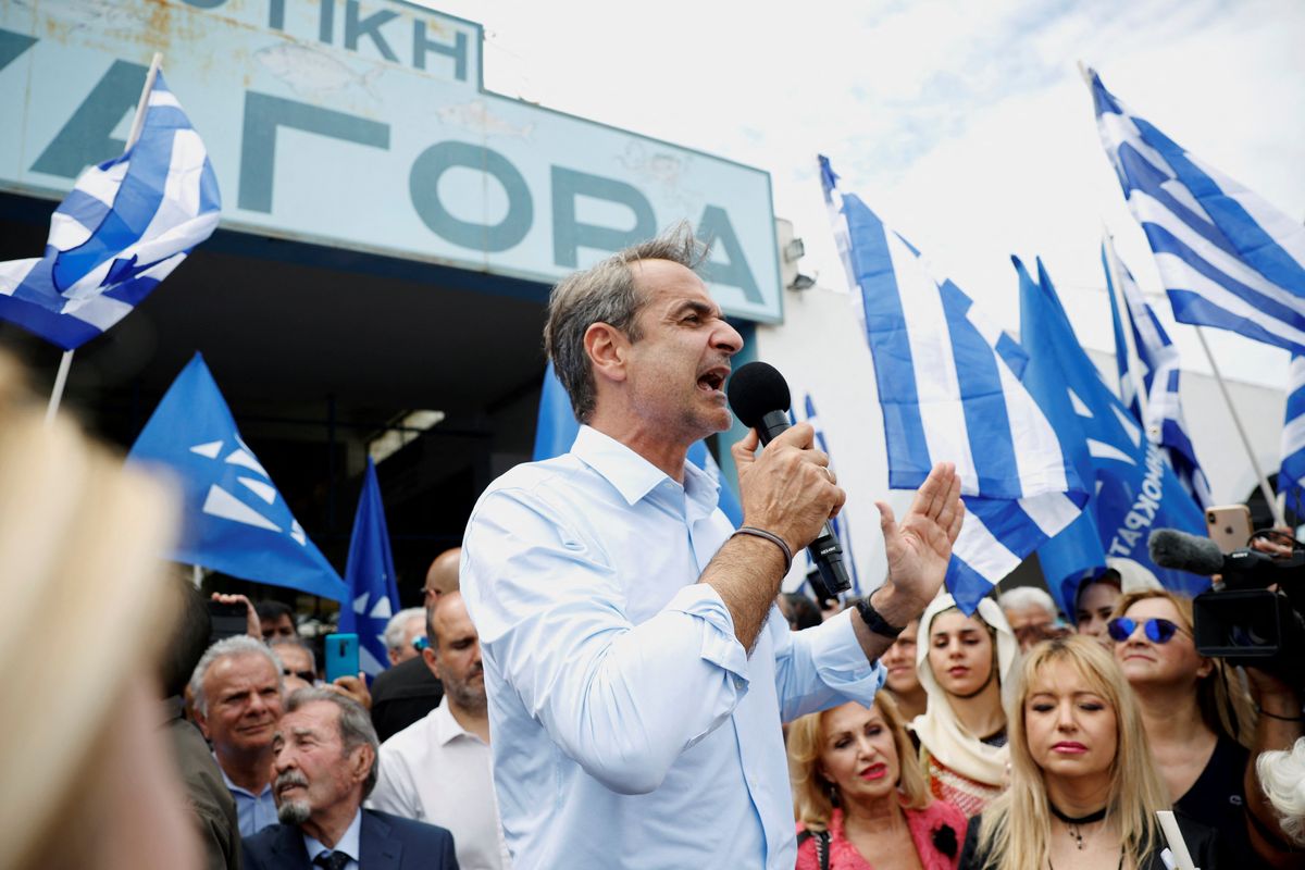 Greek PM Kyriakos Mitsotakis addresses supporters during a pre-election rally by the island of Salamina.