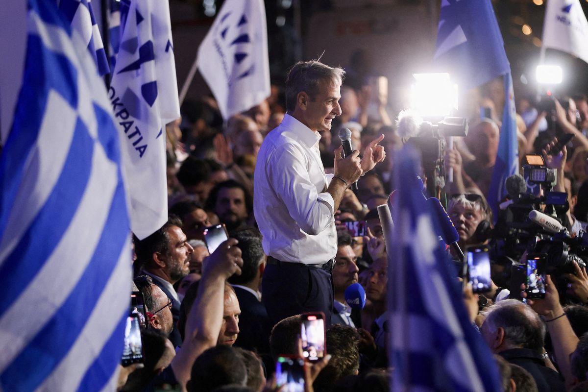 Greek PM  Kyriakos Mitsotakis speaks to supporters outside his New Democracy party's headquarters in Athens.