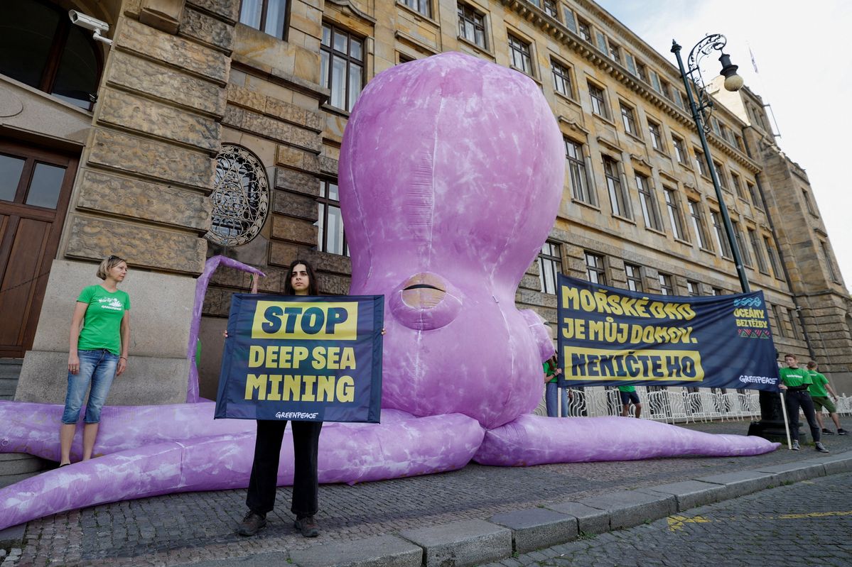 Greenpeace activists hold a protest demanding an end to deep-sea mining in Prague, Czech Republic.