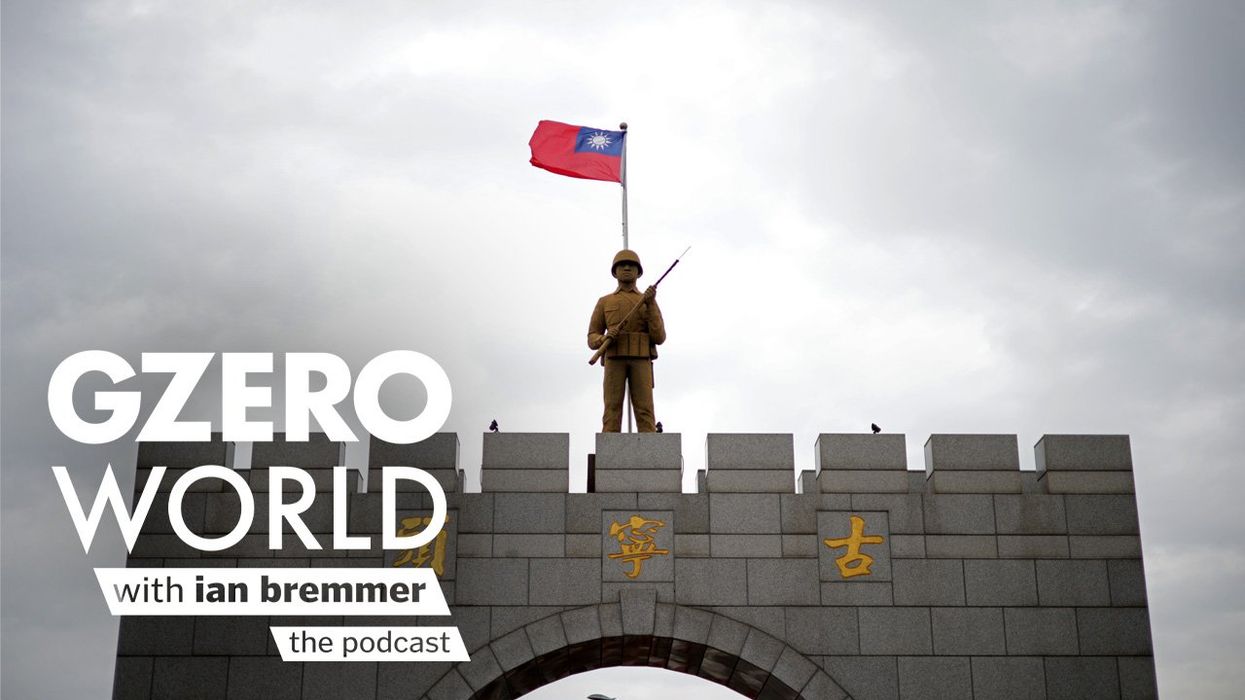 GZERO World podcast logo superimposed on a photo of a statute of a Taiwanese soldier with a Taiwan flag.