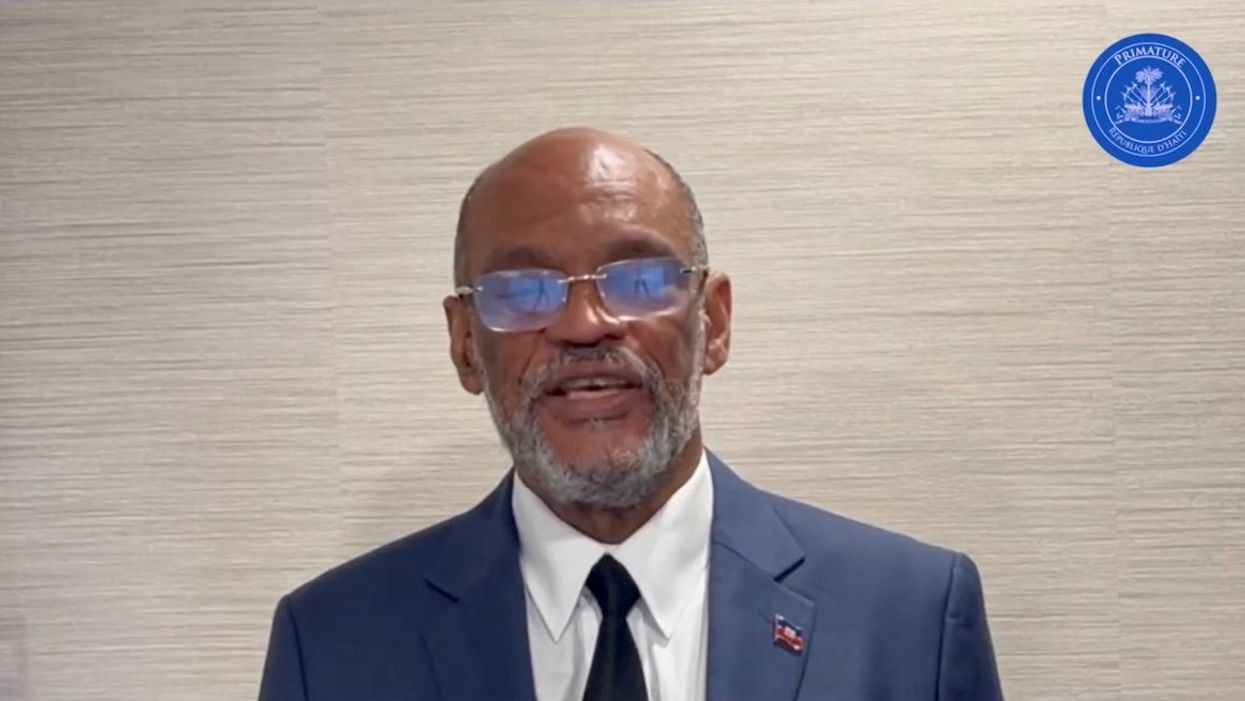 Haiti's Prime Minister Ariel Henry speaks while addressing the nation, at an unidentified location on a date given as March 11, 2024, in this screengrab obtained from a handout video.