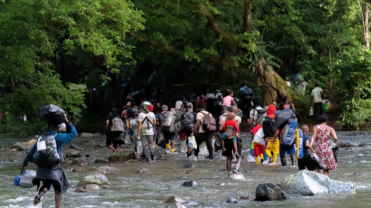Haitian migrants trek through the Darien Gap towards the border with Panama.