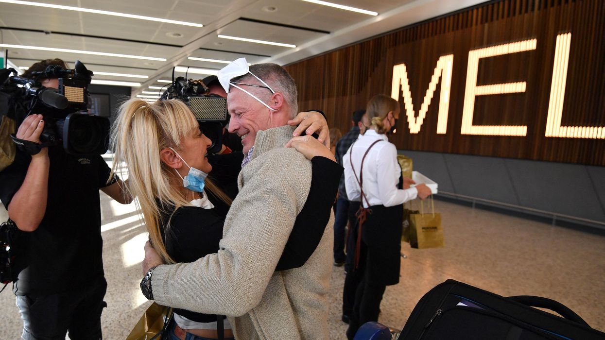 Hard Numbers: Australia reopens, Somali suicide blast, Queen tests positive, Credit Suisse leak, Indian death sentences