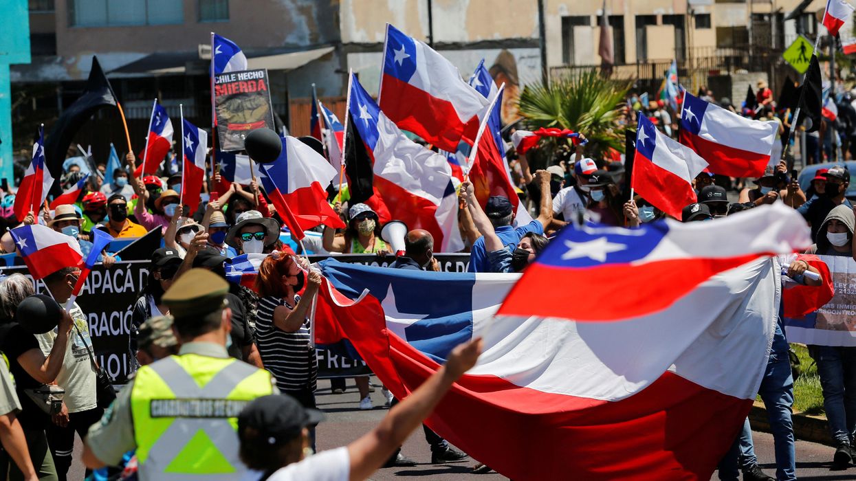 Hard Numbers: Chileans protest Venezuelan migrants, US rent on the rise, Myanmar coup anniversary, Benefits of Brexit