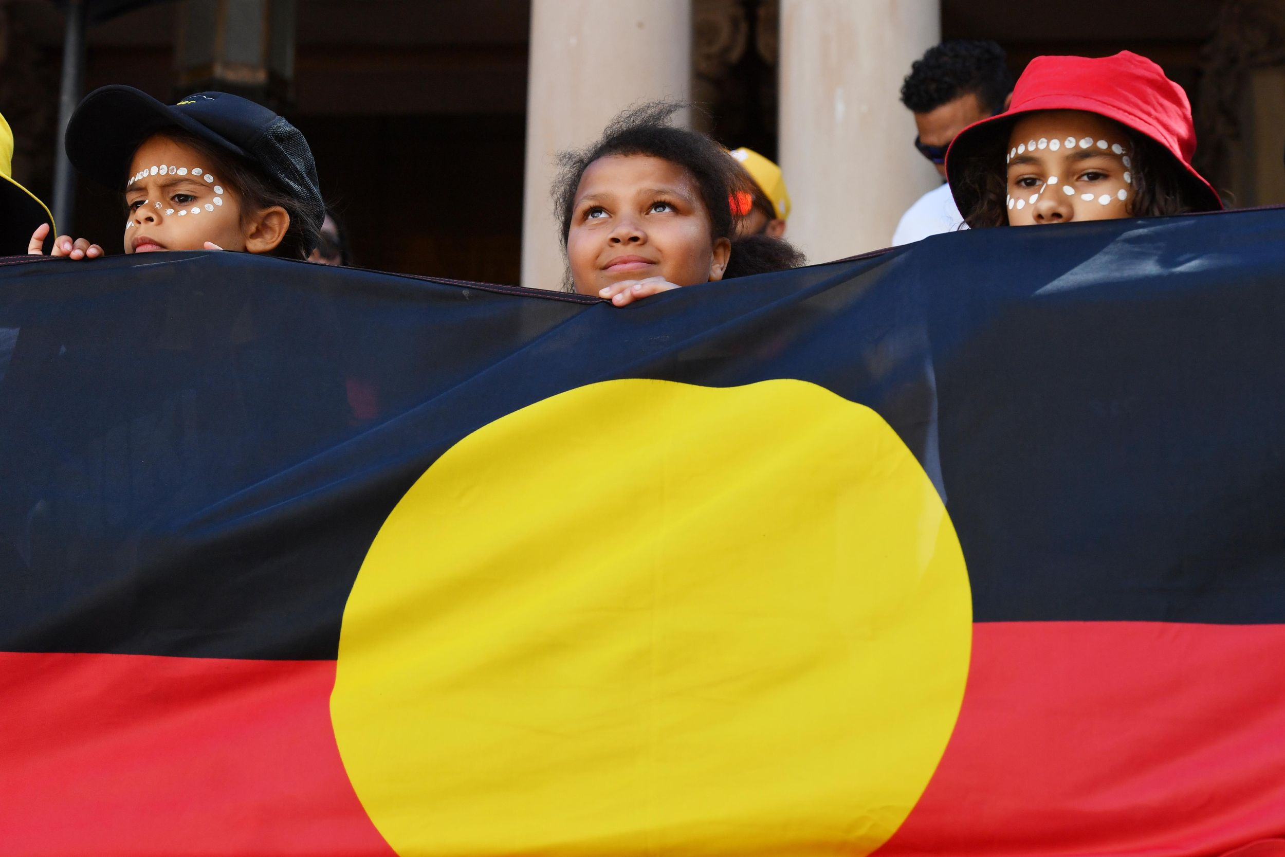 Hard Numbers: Oz buys Aboriginal flag, Malawi vs corruption, ISIS human shields, Boris the party animal