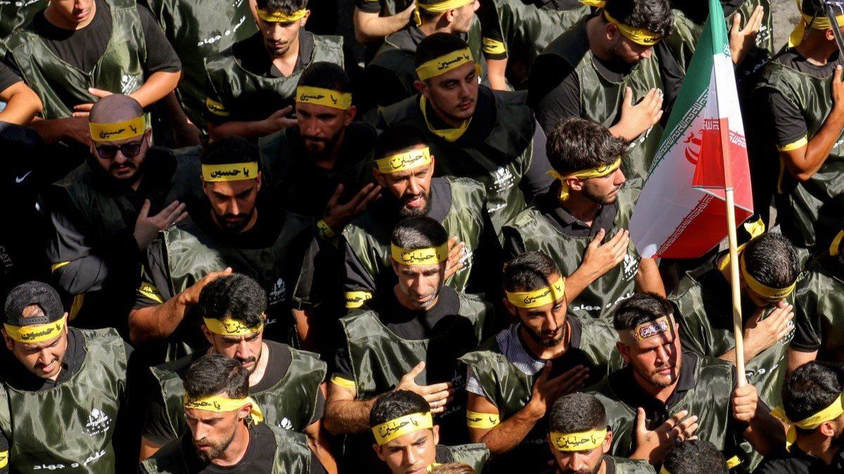 ​Hezbollah beat on their chests as a sign of mourning during a mass rally to mark Ashoura, commemorating the martyrdom of the Prophet Muhammad's grandson Hussein. 