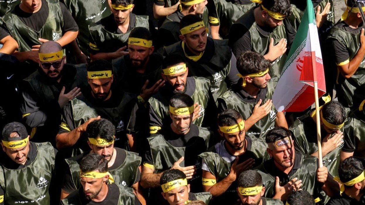 Hezbollah beat on their chests as a sign of mourning during a mass rally to mark Ashoura, commemorating the martyrdom of the Prophet Muhammad's grandson Hussein.