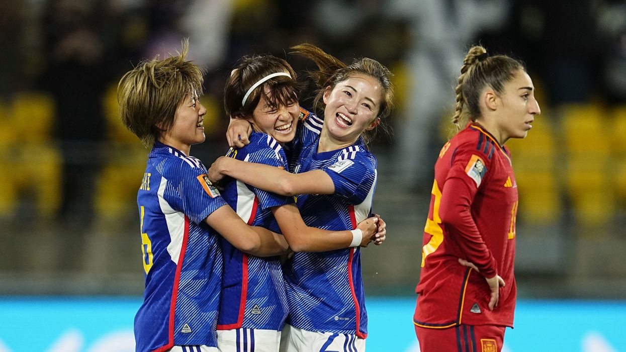 Hinata Miyazawa (2nd from L) of Japan celebrates with teammates after scoring her team's third goal in the first half of a Women's World Cup