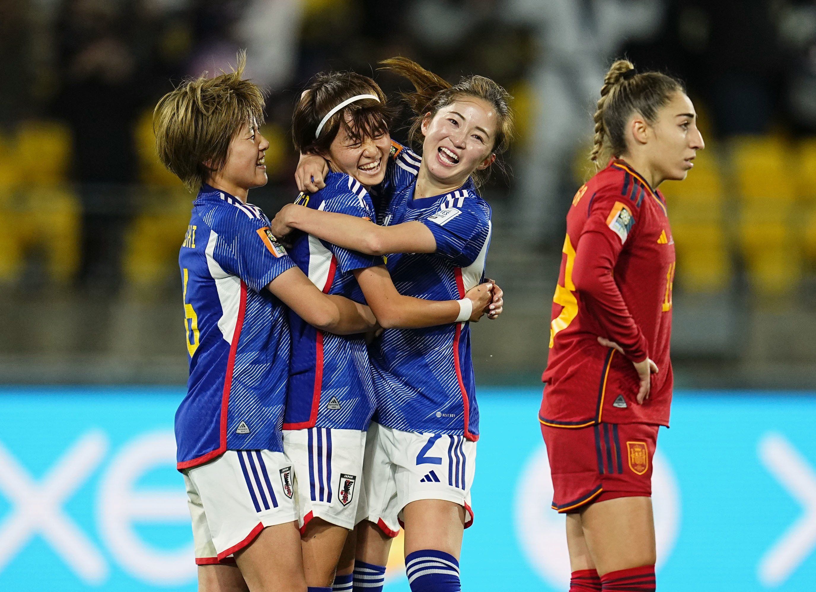 Hinata Miyazawa (2nd from L) of Japan celebrates with teammates after scoring her team's third goal in the first half of a Women's World Cup 