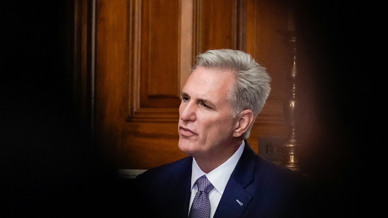 House Speaker Kevin McCarthy speaks to reporters in the US Capitol after the House of Representatives passed a stopgap government funding bill to avert an immediate government shutdown.