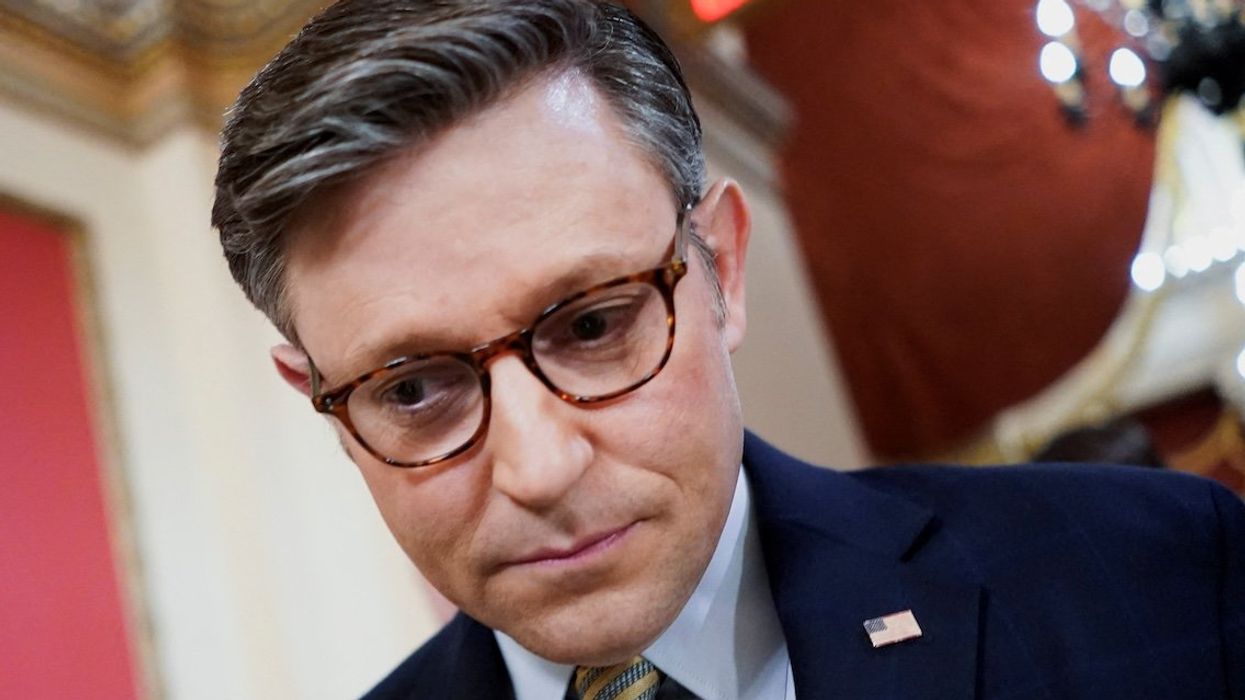 House Speaker Mike Johnson (R-LA) reacts following the passage of spending legislation to avert a government shutdown, on Capitol Hill, in Washington, on Dec. 20, 2024.