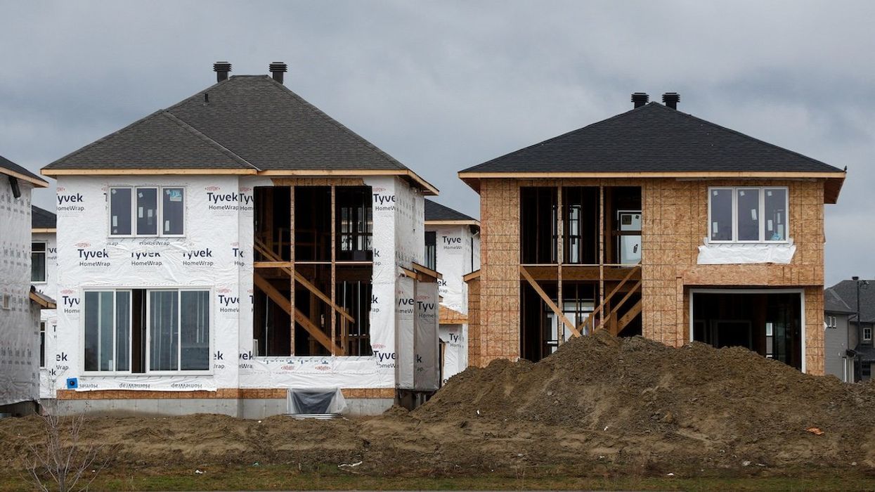 Houses are seen under construction in a neighbourhood of Ottawa, Ontario, Canada.