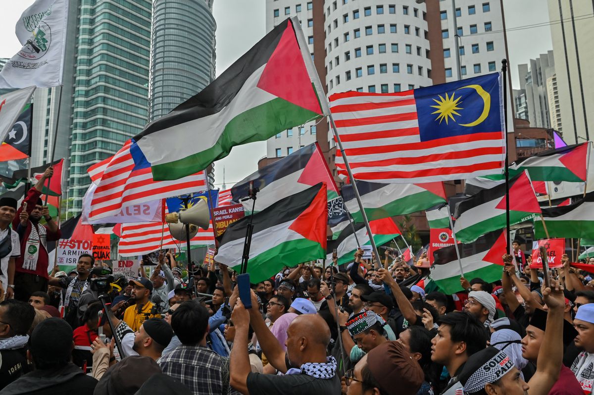 Hundreds of Muslim activists gather to protest in solidarity in the wake of the conflict between Israel and Hamas in the Gaza Strip outside the US embassy in Kuala Lumpur, Malaysia on October 20, 2023