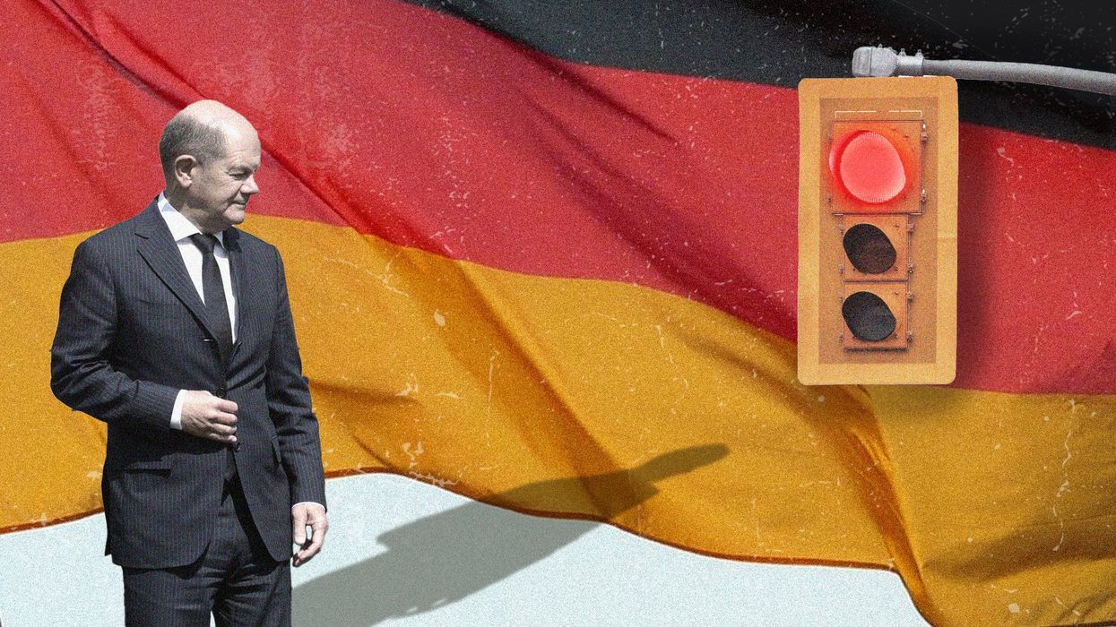 Illustration of Chancellor Olaf Scholz next to a traffic light