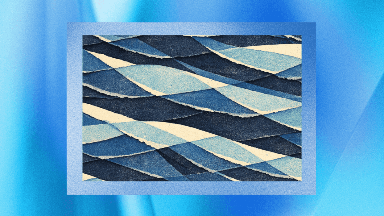 Image of waves made by paper with a blue background