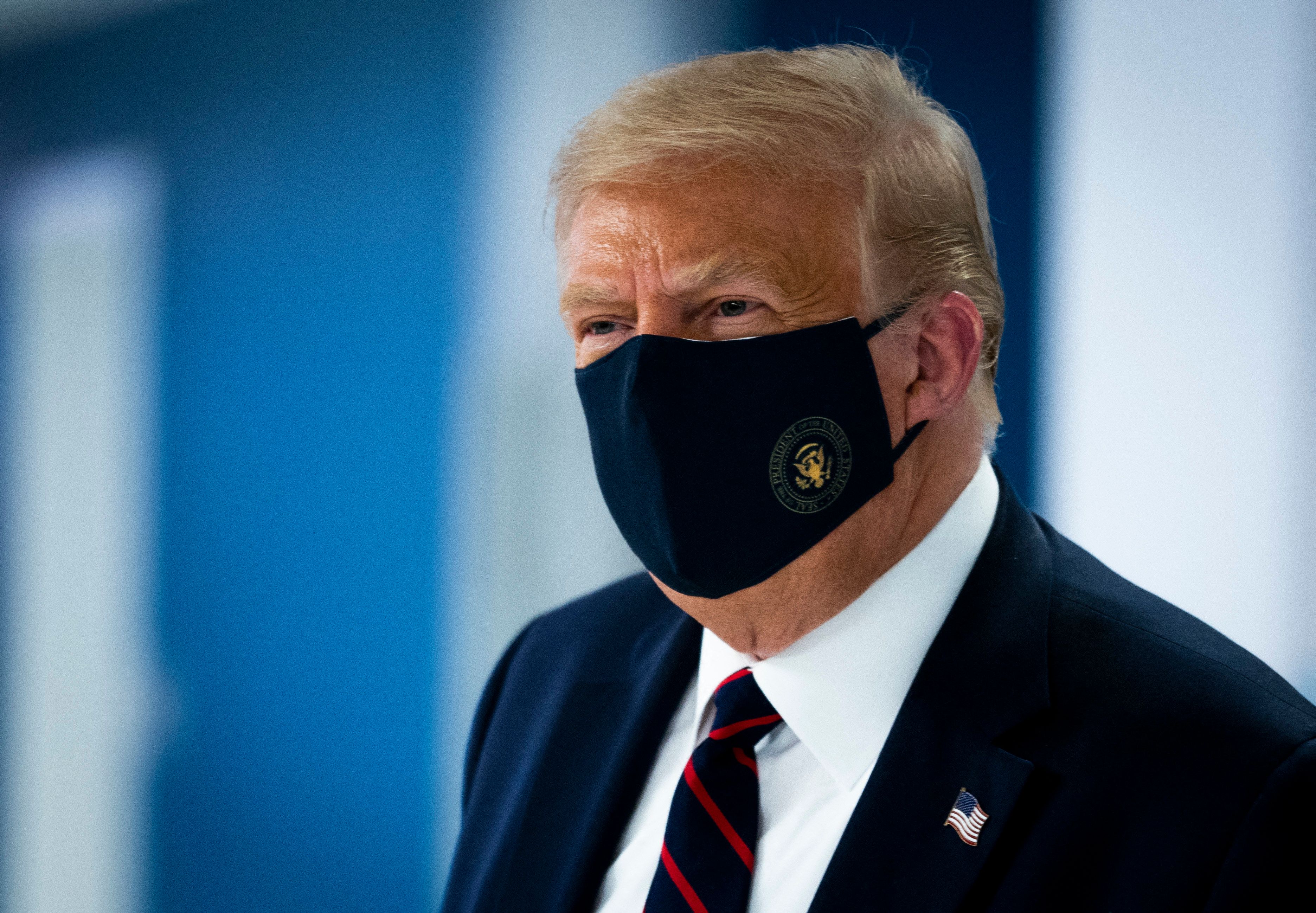 US President Donald Trump wearing a face mask against COVID-19. Reuters