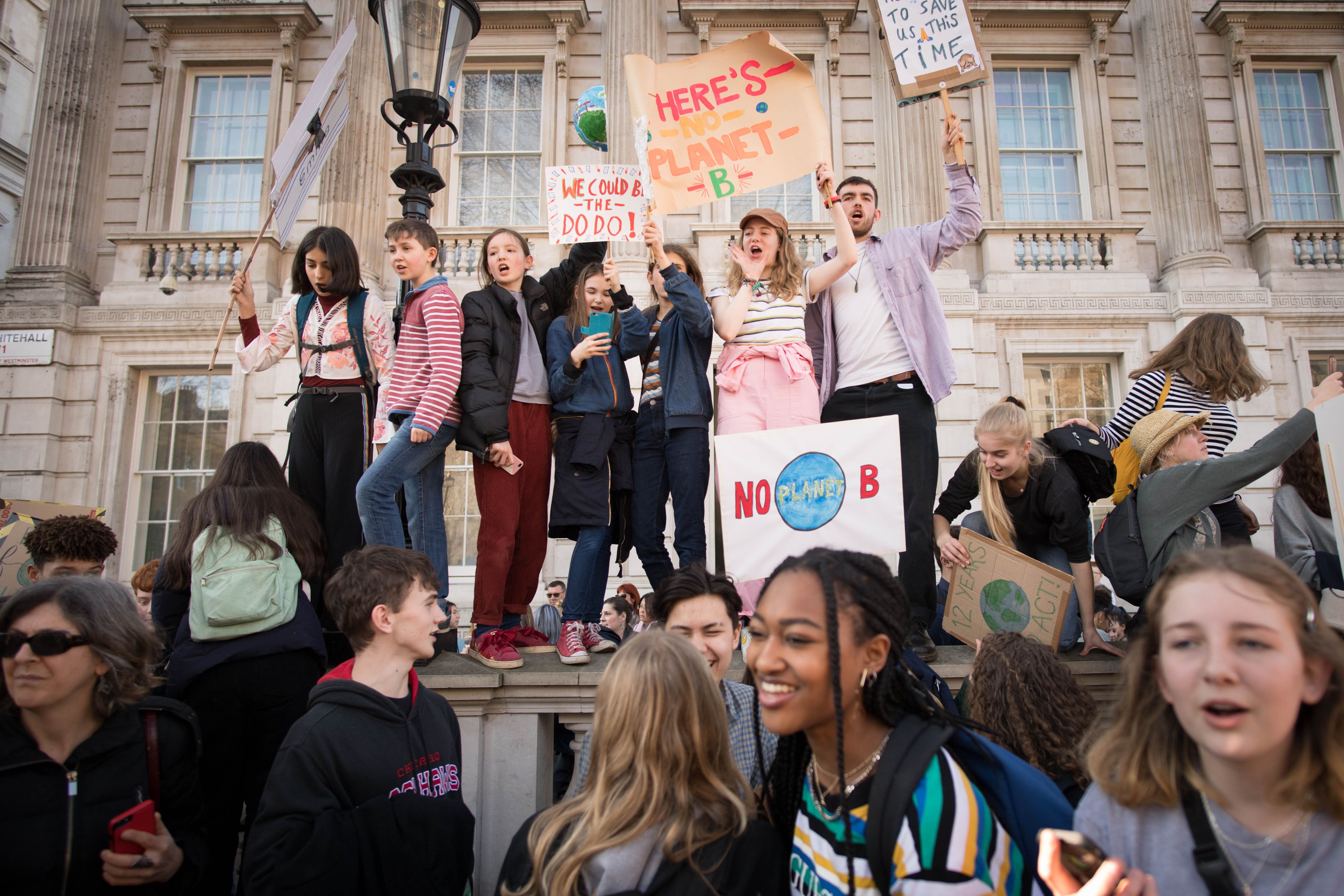 Students from the Youth Strike 4 Climate movement during a climate change protest on Parliament Square in Westminster, London. Reuters