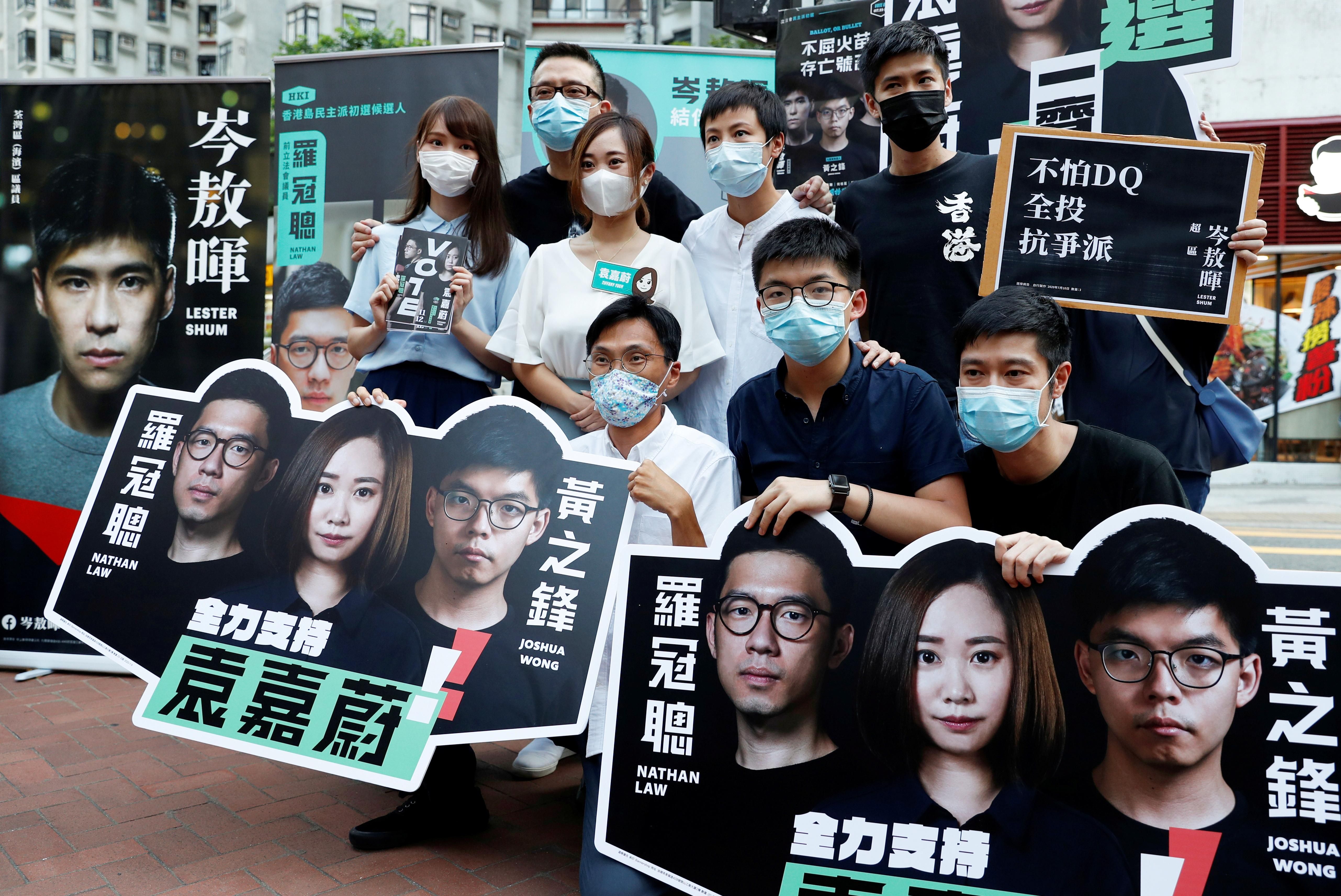 Pro-democracy activists campaigning during primary elections to select opposition candidates in Hong Kong, China. Reuters