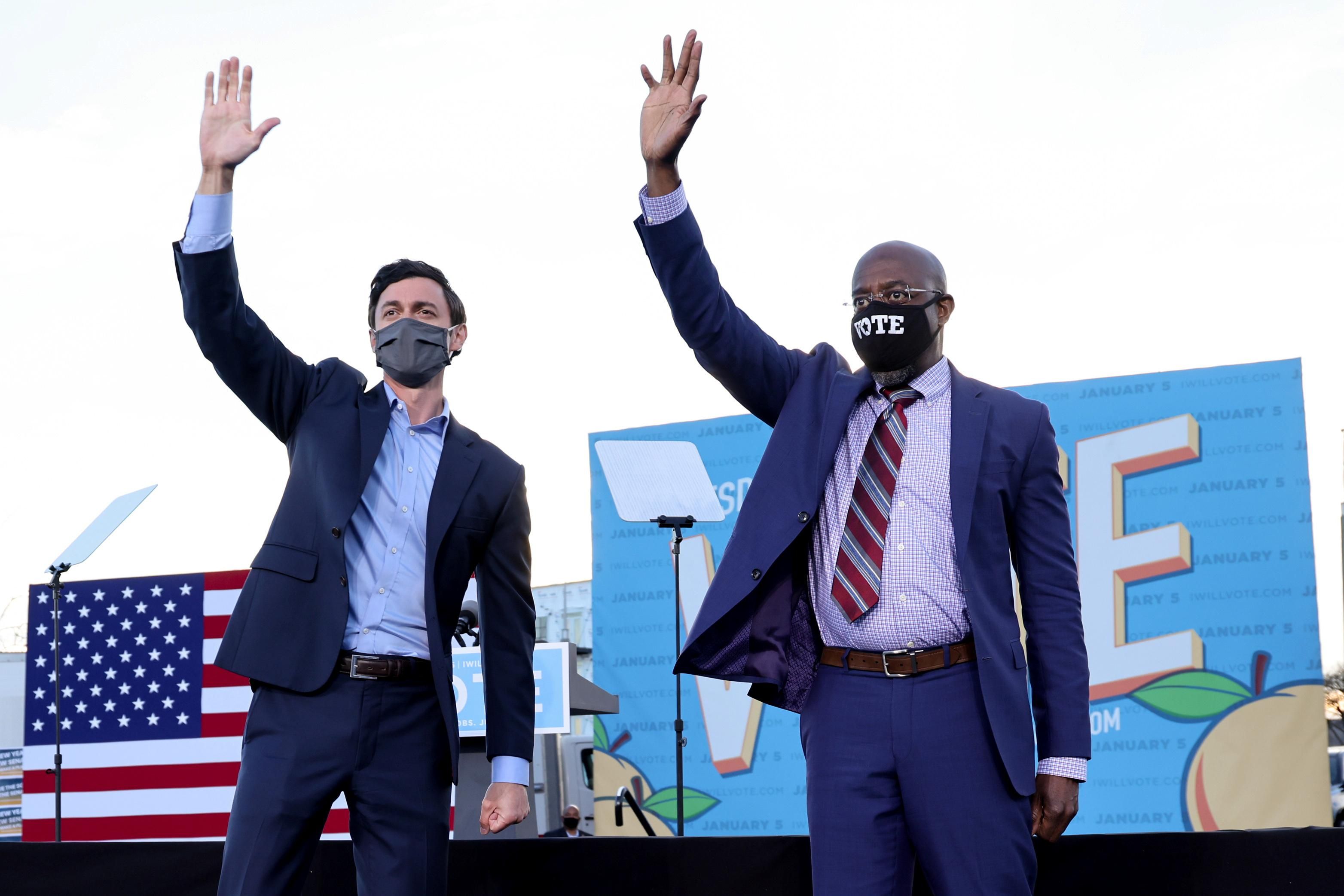 US senators-elect Jon Ossoff and Raphael Warnock campaign at a rally ahead of runoff elections in Atlanta, Georgia. Reuters