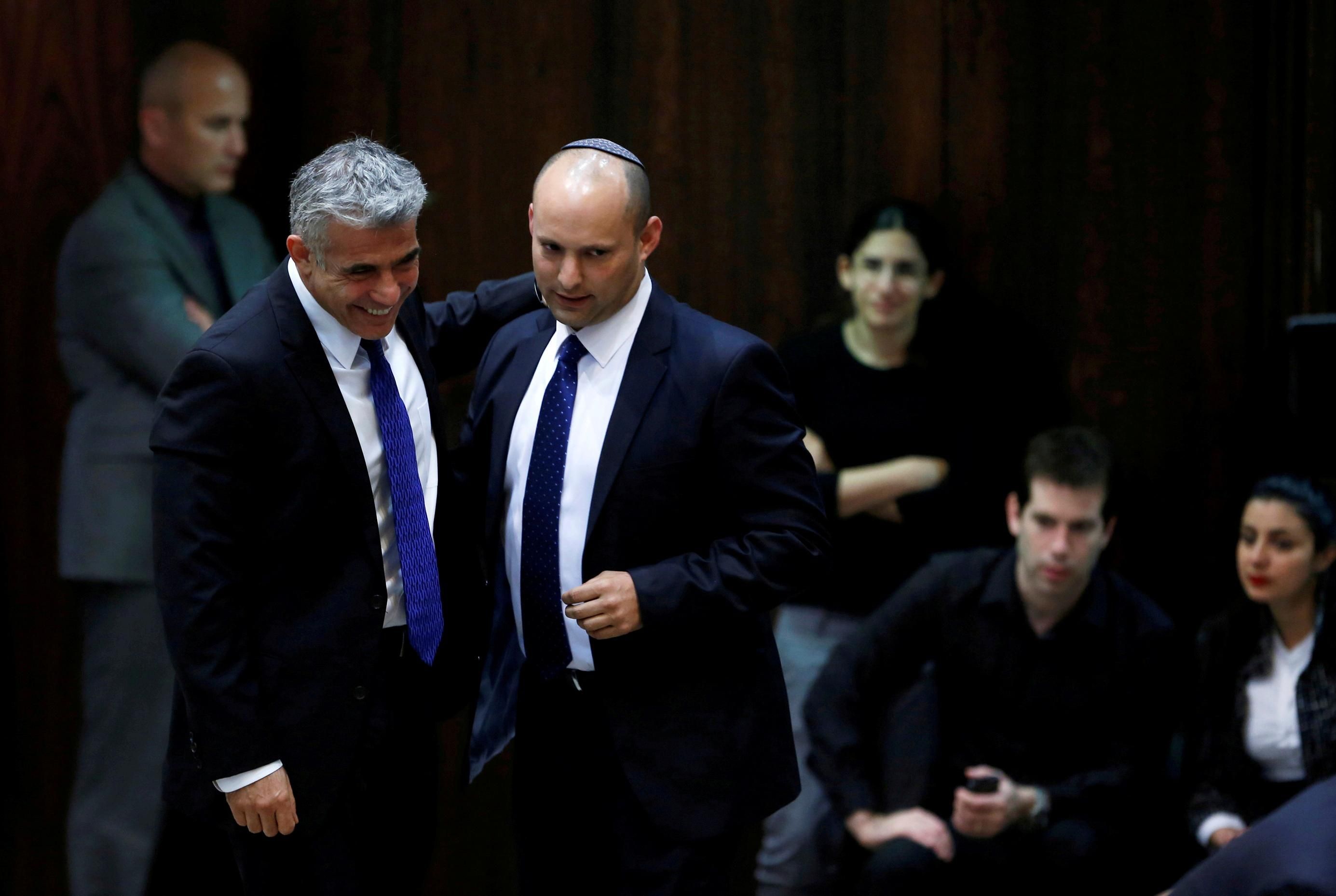 Yesh Atid leader Yair Lapid and Yamina leader Naftali Bennett 