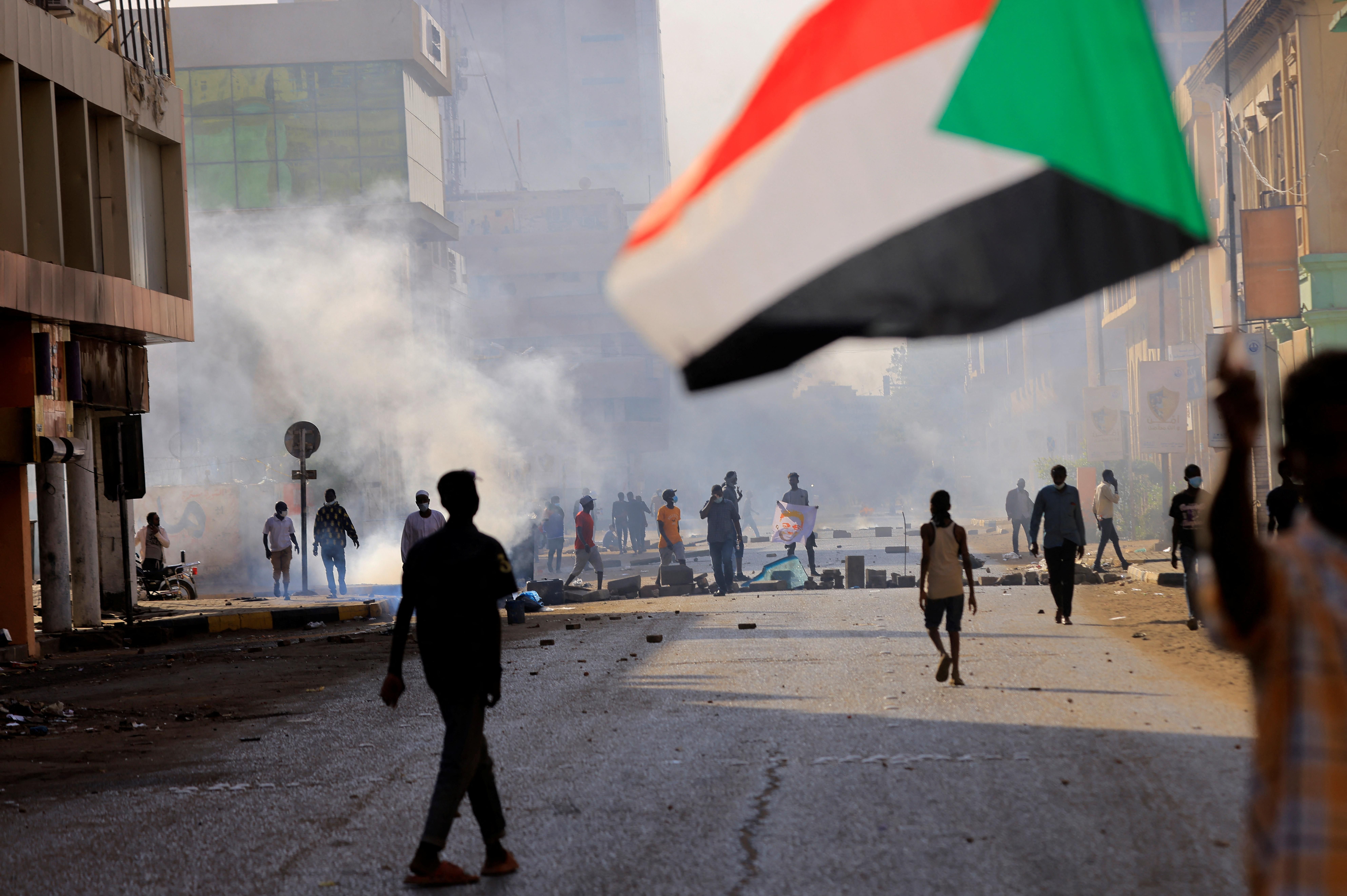 People march to the presidential palace, protesting against military rule following last month's coup in Khartoum, Sudan December 19, 2021.