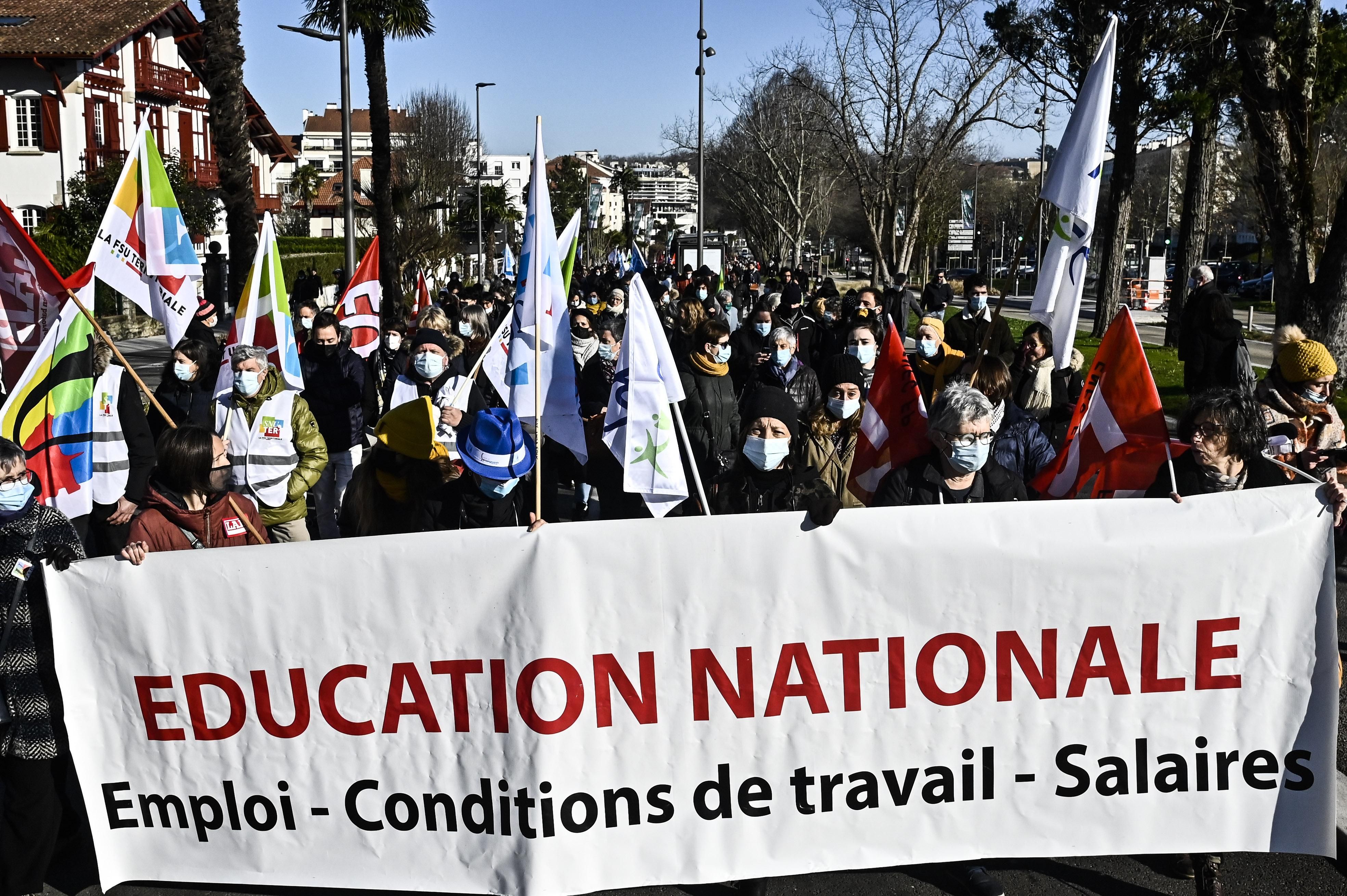 Hard Numbers: French teachers strike, Spanish doctors compensated, Lula soaring in Brazil, Biden pledges more COVID tests
