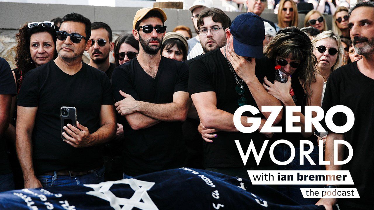 Israelis mourning their loved ones who did not survive the Hamas attack with the logo of GZERO World with Ian Bremmer - the podcast
