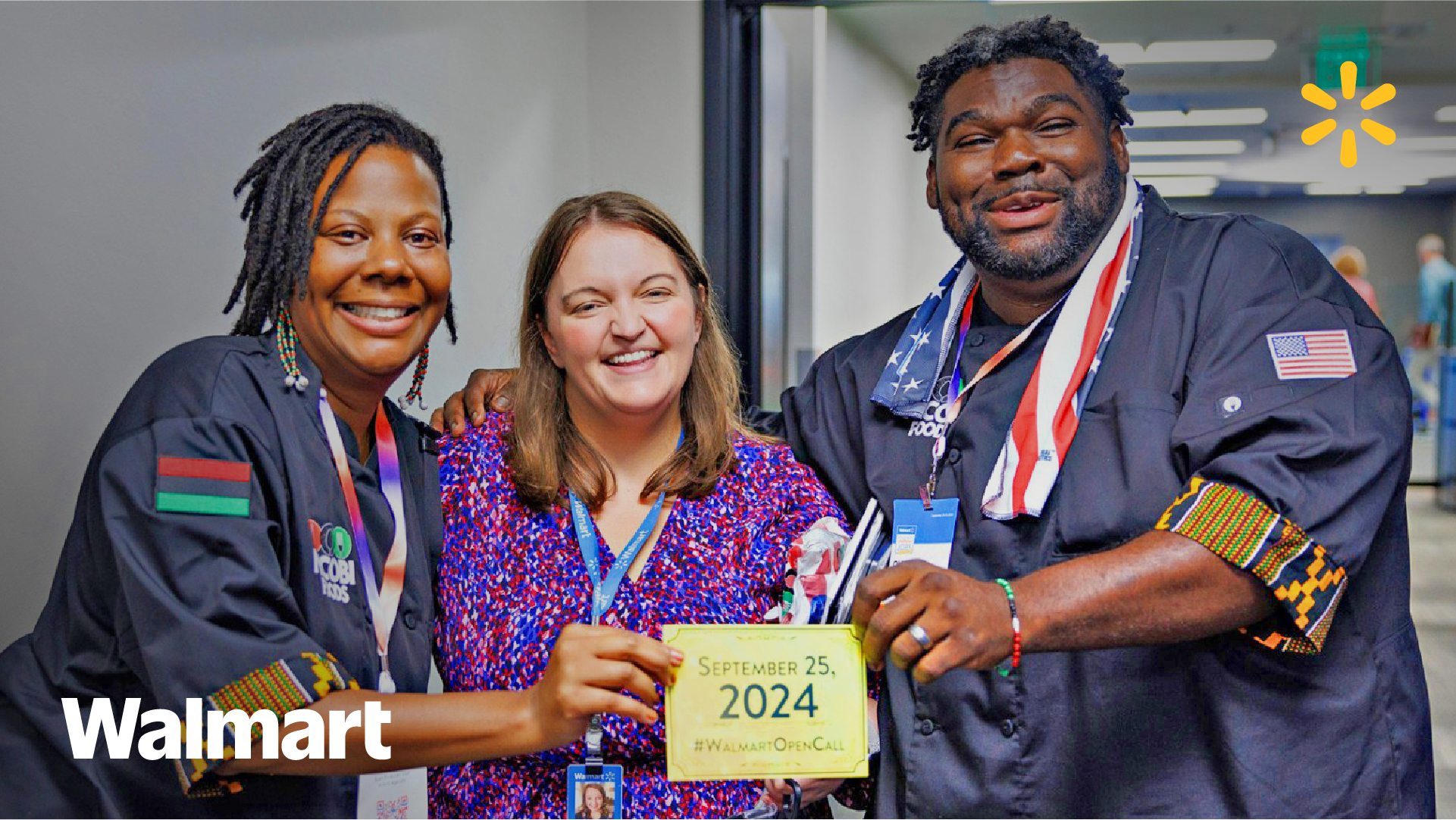 Three Walmart employees smiling