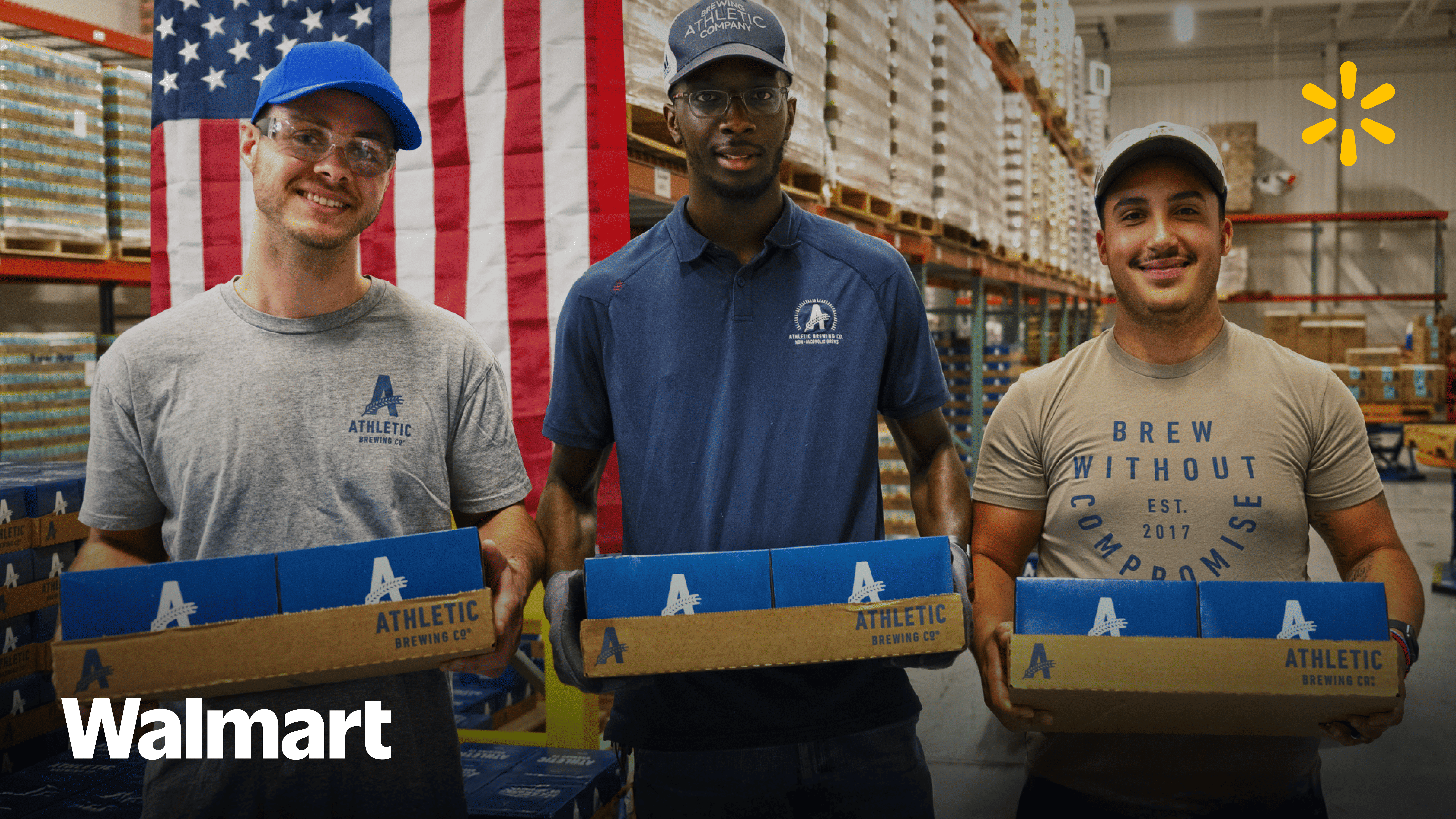 Three people holding crates 