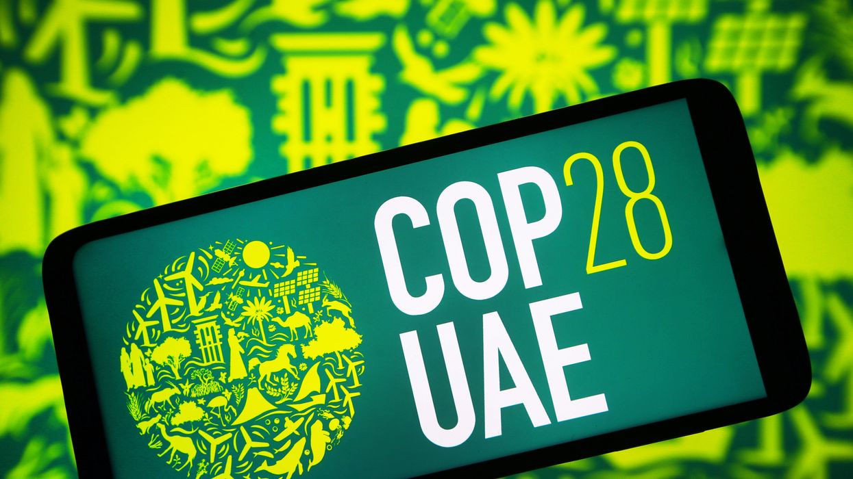In this photo illustration, the 2023 United Nations Climate Change Conference COP28 UAE logo is seen on a smartphone screen.