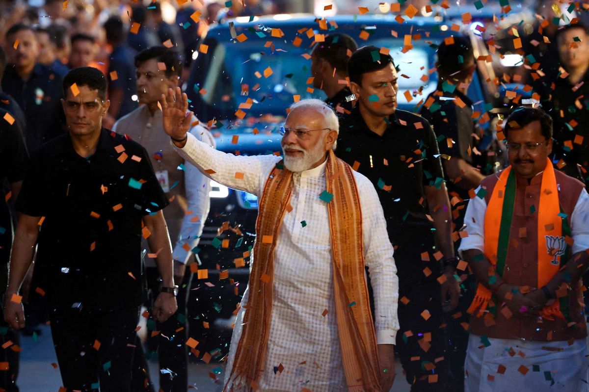 India's Prime Minister Narendra Modi greets his supporters as he arrives at the Bharatiya Janata Party (BJP) headquarters as the BJP won the Assam state assembly election and was on course to win West Bengal, in New Delhi, India, May 4, 2026.