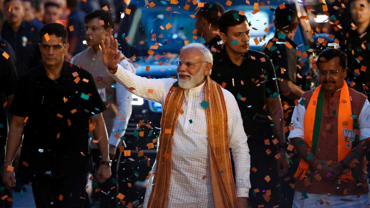 India's Prime Minister Narendra Modi greets his supporters as he arrives at the Bharatiya Janata Party (BJP) headquarters as the BJP won the Assam state assembly election and was on course to win West Bengal, in New Delhi, India, May 4, 2026.