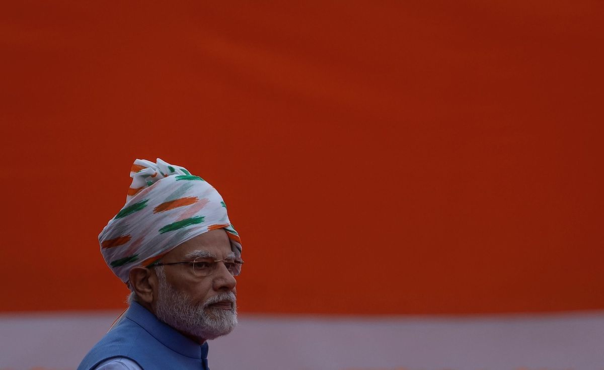 Indian PM Narendra Modi walks after inspecting the honor guard during Independence Day celebrations at the historic Red Fort in Delhi.