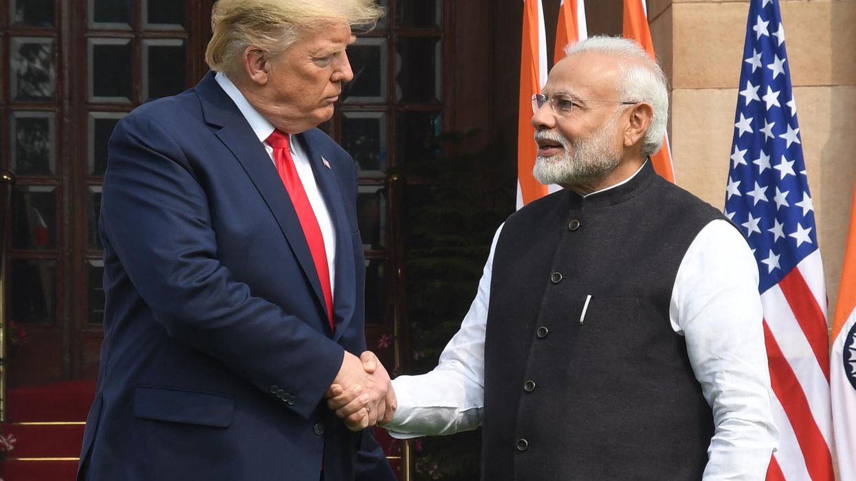 Indian Prime Minister Narendra Modi and then-US President Donald Trump shake hands before a meeting at Hyderabad House in Delhi, India, on Feb. 25, 2020.