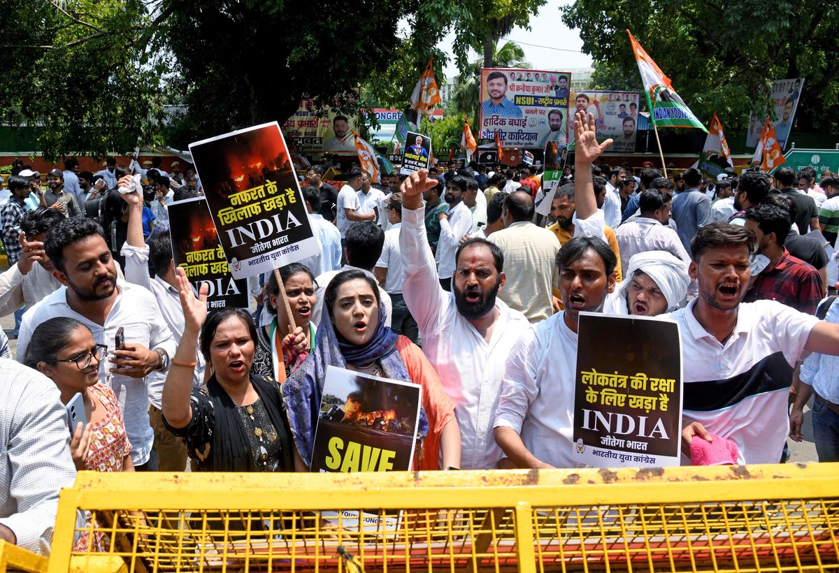 Indians protest about the ongoing Manipur violence in New Delhi.