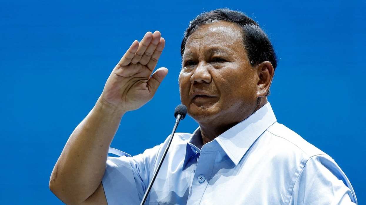 Indonesian Defense Minister and presidential candidate Prabowo Subianto salutes supporters after delivering a speech at the Jakarta Convention Center during a campaign rally in Jakarta, Indonesia, on Feb. 2, 2024. 