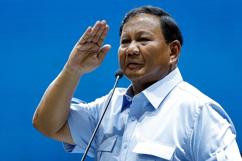 Indonesian Defense Minister and presidential candidate Prabowo Subianto salutes supporters after delivering a speech at the Jakarta Convention Center during a campaign rally in Jakarta, Indonesia, on Feb. 2, 2024. 