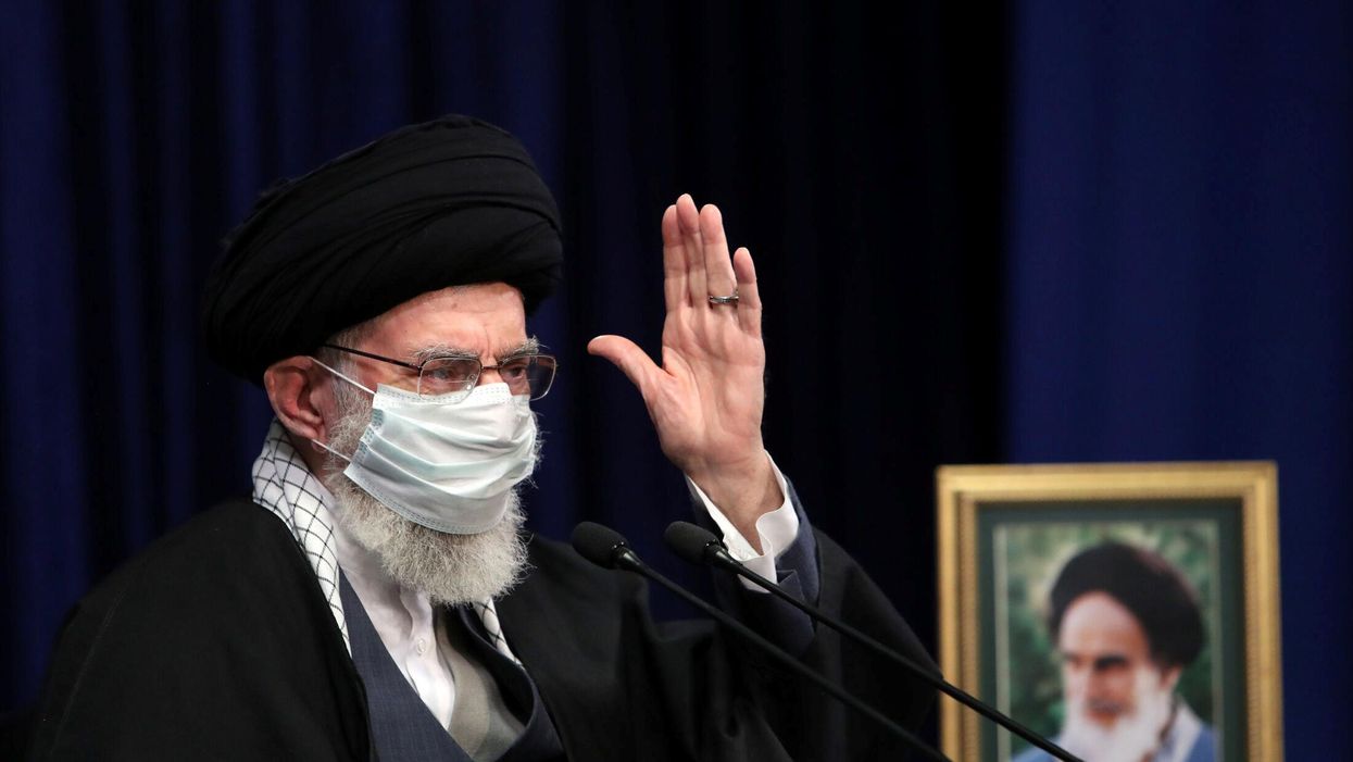 Iran's Supreme Leader Ayatollah Ali Khamenei wears a mask during a virtual speech, in Tehran, Iran February 17, 2021.