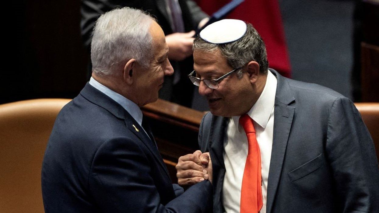 Israel Prime minister Benjamin Netanyahu and Itamar Ben Gvir shake hands as the Israeli government approve Netanyahu's proposal to reappoint Itamar Ben-Gvir as minister of National Security, in the Knesset, Israeli parliament in Jerusaelm, March 19, 2025