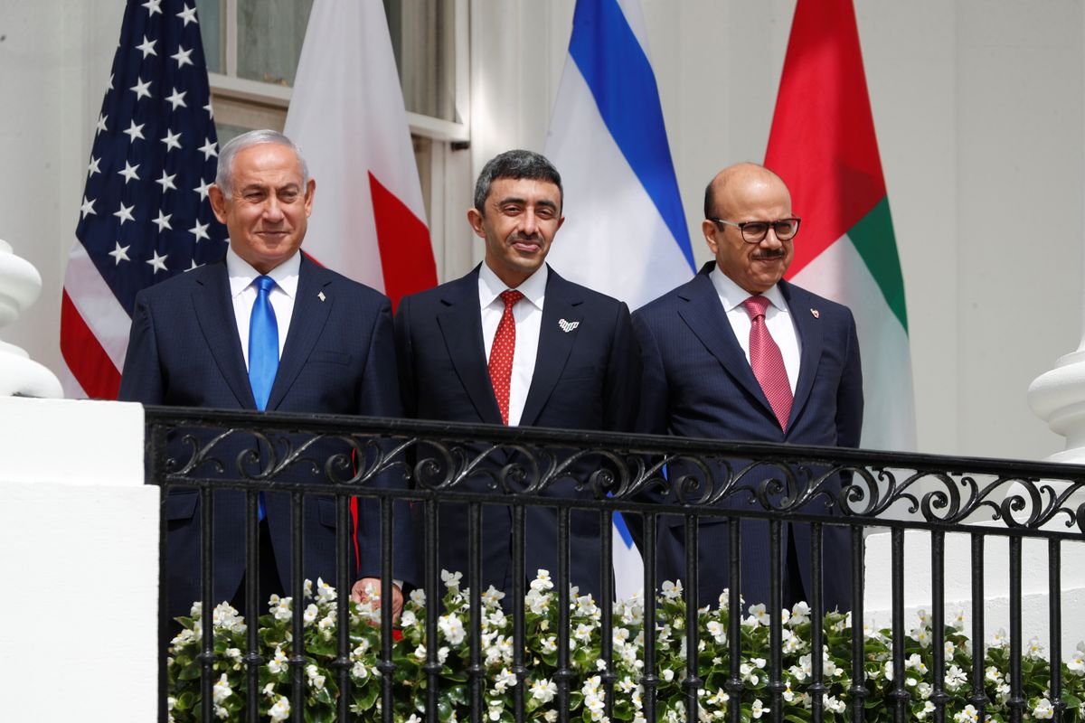Israel Prime Minister Benjamin Netanyahu, UAE Foreign Minister Abdullah bin Zayed and Bahrain's Foreign Minister Abdullatif Al Zayani stand by prior to signing the Abraham Accords with US President Donald Trump at the White House. Reuters