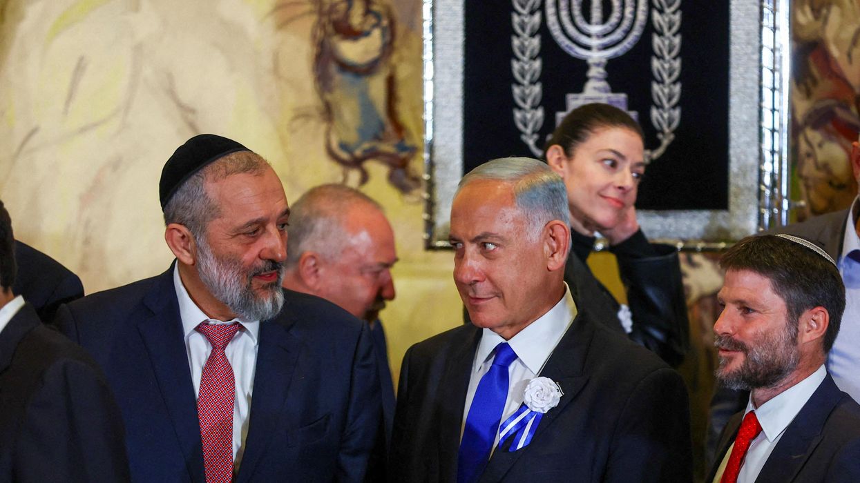 Israel's PM Benjamin Netanyahu with other members of the new Israeli parliament after their swearing-in ceremony in Jerusalem.