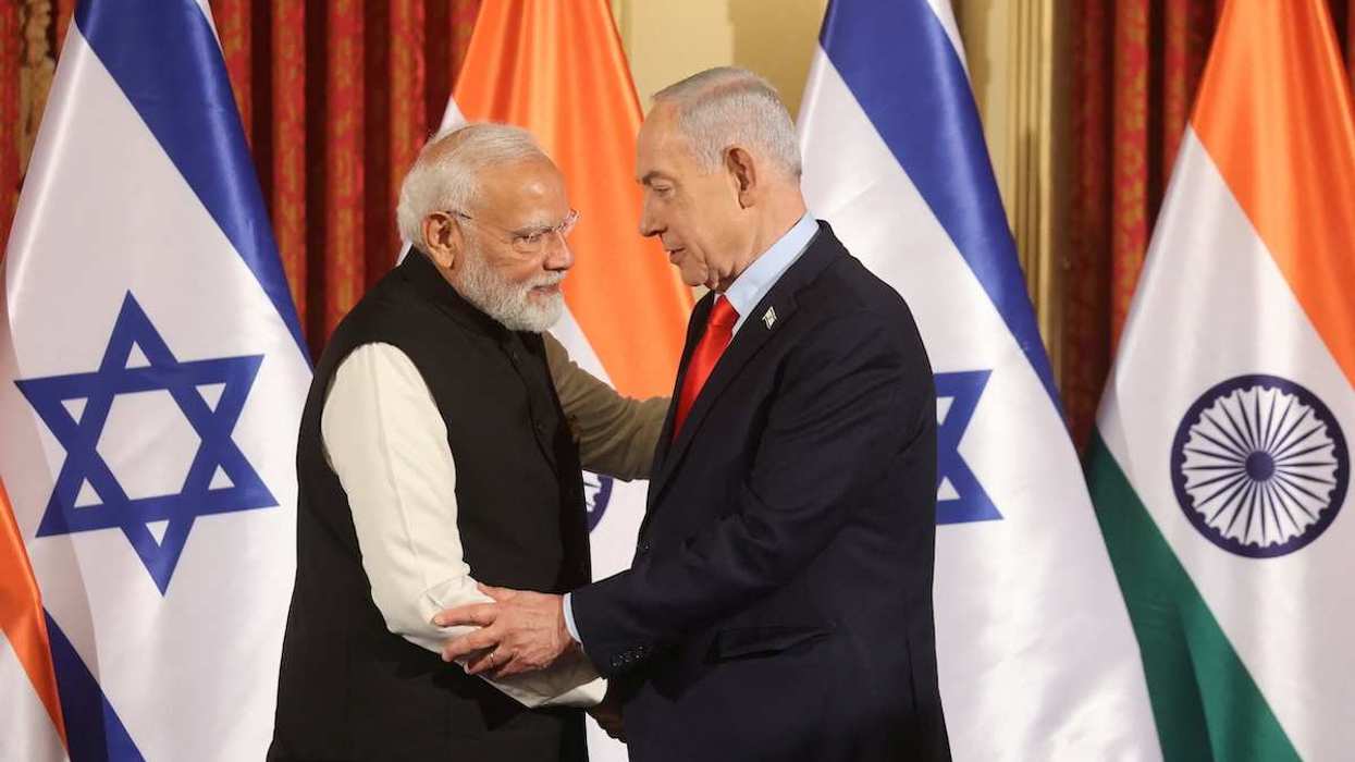 Israel's Prime Minister Benjamin Netanyahu and India's Prime Minister Narendra Modi shake hands during a press conference in Jerusalem on February 26, 2026.