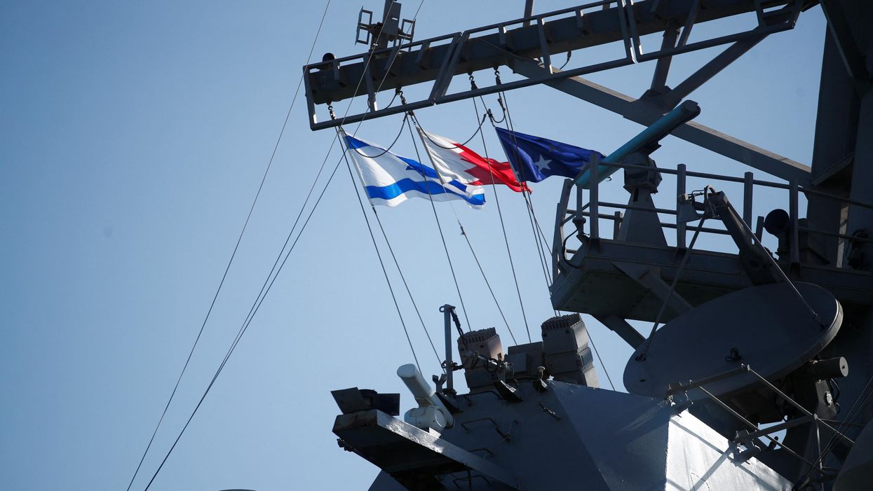 Israeli and Bahraini flags are seen on USS COLE (DDG-67) during Defence Minister Benny Gantz's visit to 5th Fleet Headquarters Navy Base in Juffair, Bahrain, February 3, 2022.