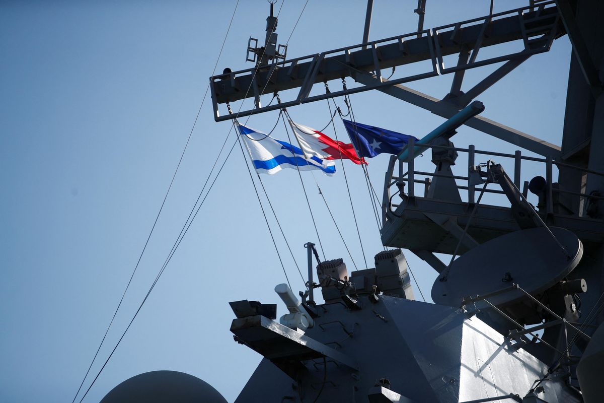 Israeli and Bahraini flags are seen on USS COLE (DDG-67) during Defence Minister Benny Gantz's visit to 5th Fleet Headquarters Navy Base in Juffair, Bahrain, February 3, 2022.