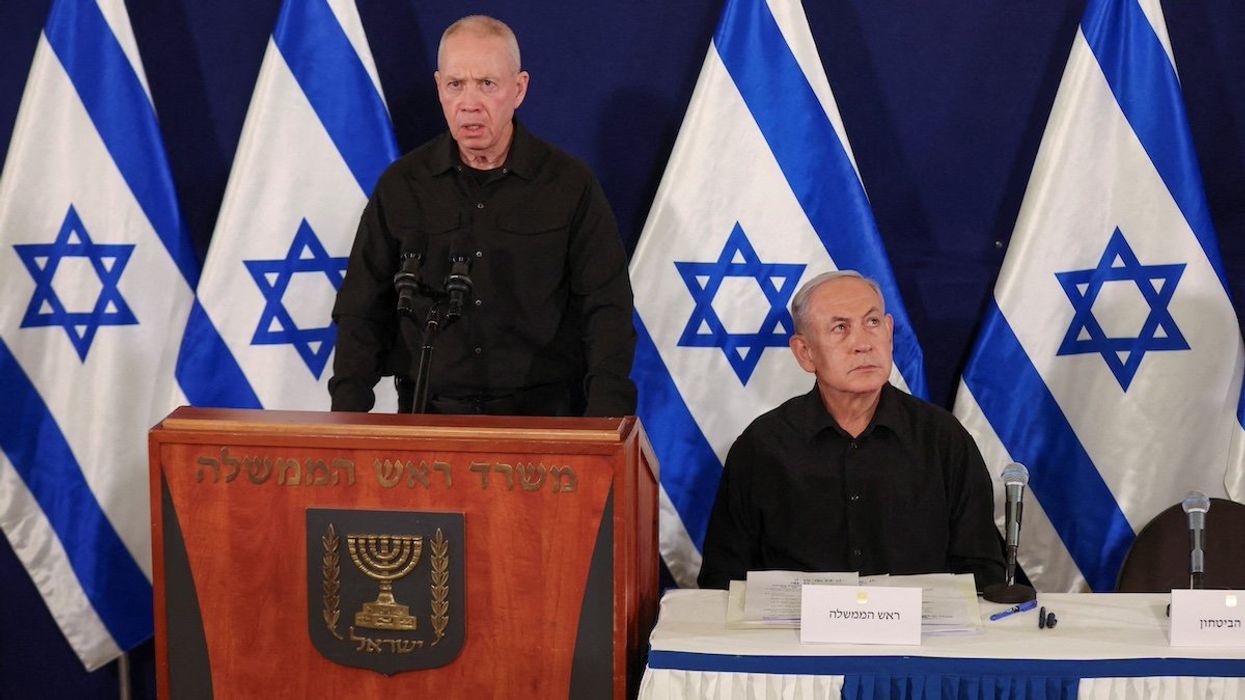Israeli defense minister Yoav Gallant speaks next to prime minister Benjamin Netanyahu during a press conference in the Kirya military base in Tel Aviv , Israel , 28 October 2023.