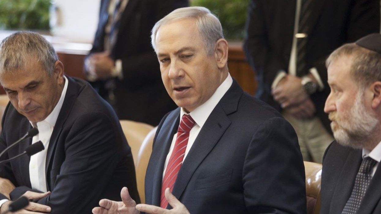 Israeli Prime Minister Benjamin Netanyahu attends the weekly cabinet meeting in Jerusalem December 27, 2015.